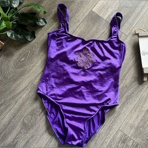 Vintage coastal images bathing suit in regal purple. Size M